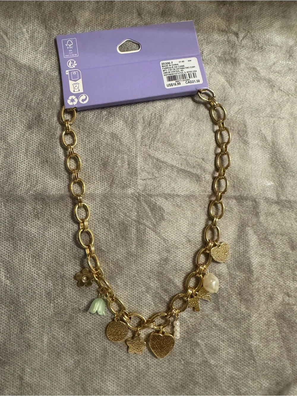 Claire's Gold Charm Necklace with Pastel Pink, Green, Blue and Cream Accents